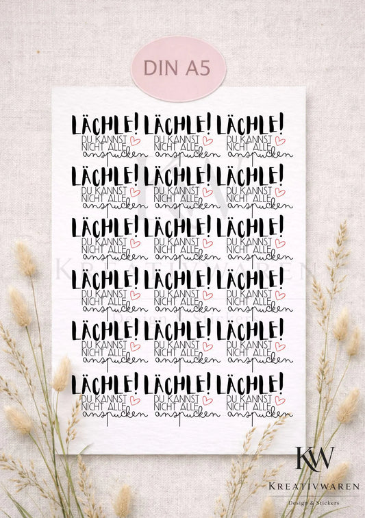 Rub Ons „Lächle! Du kannst sie nicht alle anspucken“ – A5 Rub-On Sheet, randlos